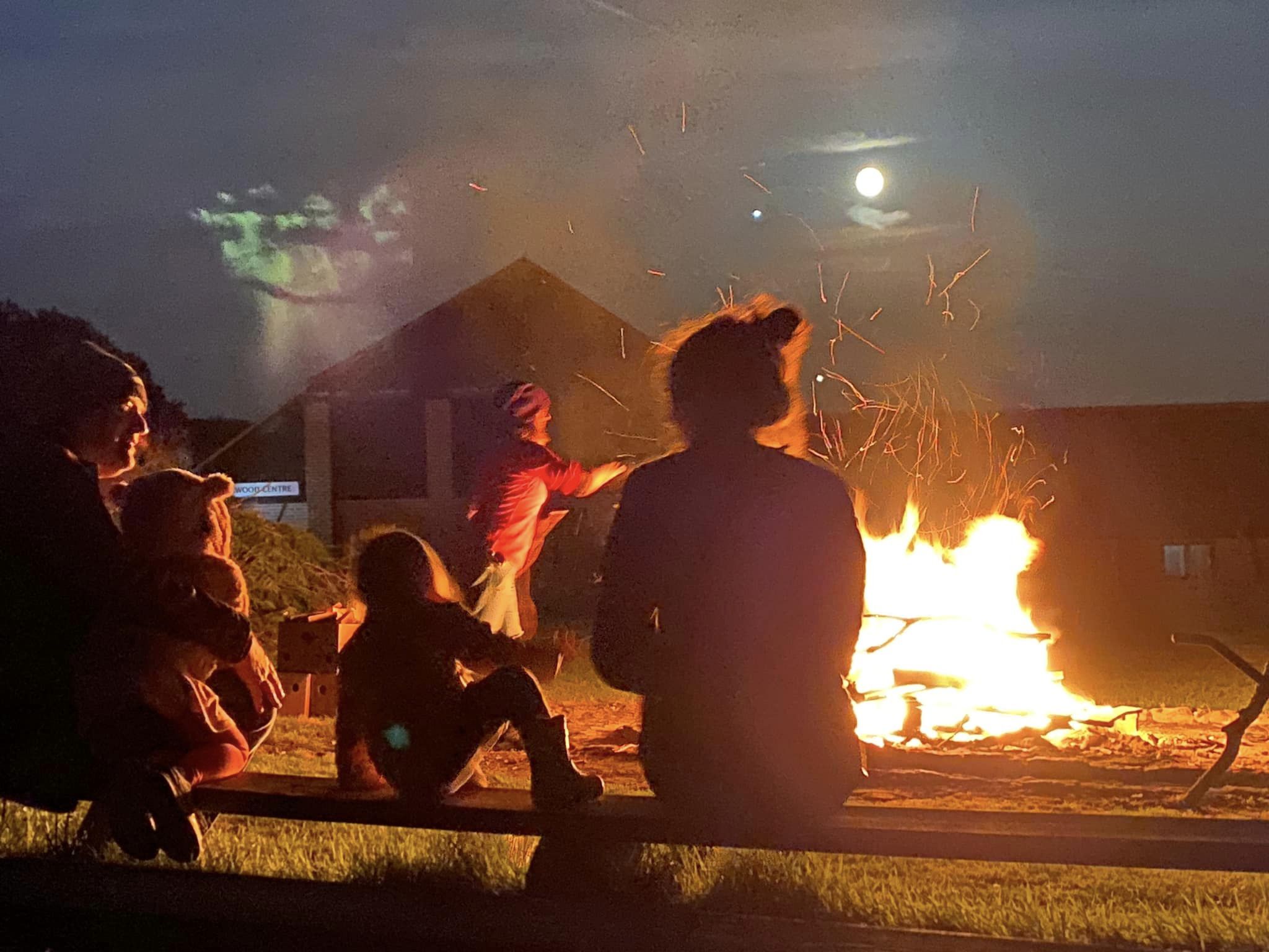 around the campfire silhouette